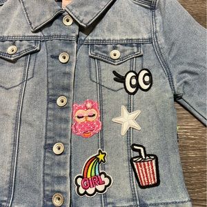 Little girls Jean Jacket with sequence and patches. Really cute jacket.
